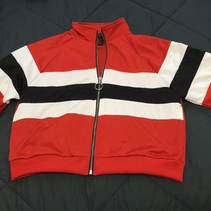 red,white and black jacket.